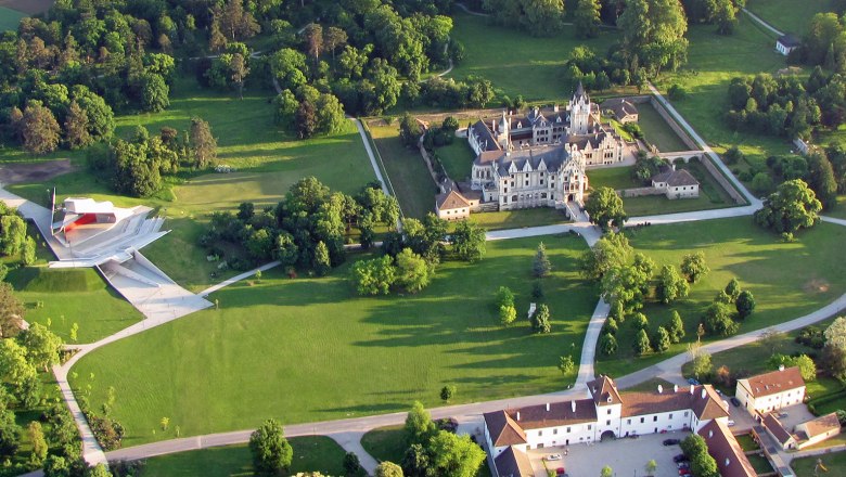 Aerial view, © Grafenegg Aerial view of Grafenegg Castle with surrounding park and modern stage.