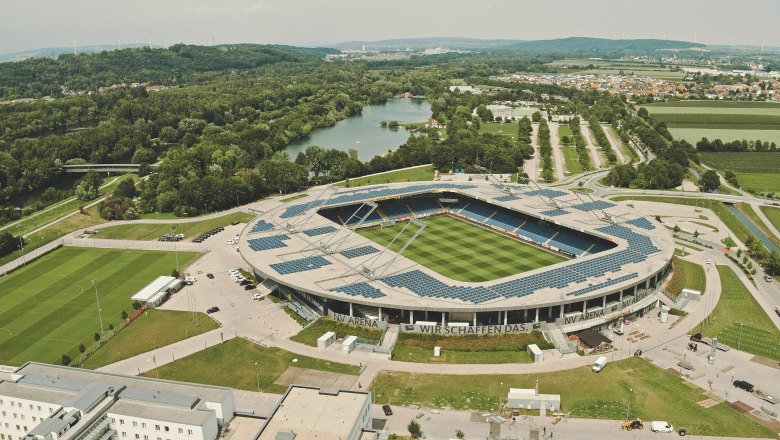 St. Pölten, Lower Austria Sports Center, © SPORTZENTRUM Niederösterreich Aerial view of the NV Arena in St. Pölten, surrounded by green countryside and a river.