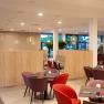Colorful furniture in a bright hotel lounge