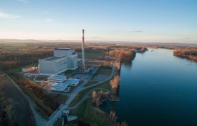 Aerial view of the Zwentendorf nuclear power plant next to a river in a rural setting.