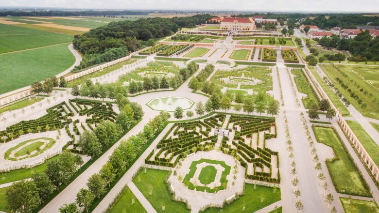 Aerial view of Schloss Hof with symmetrical gardens and paths.