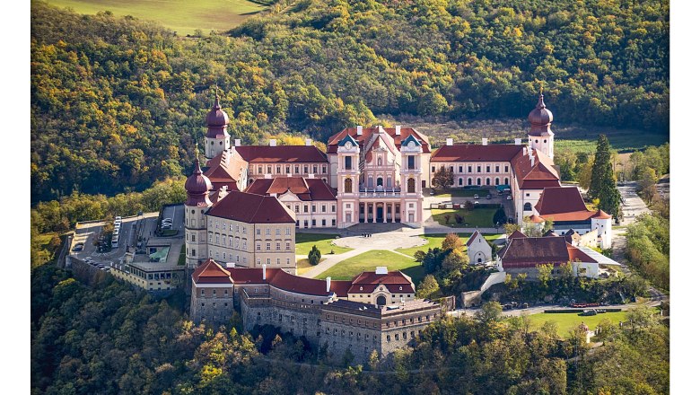 Aerial view of Göttweig Abbey in Austria, surrounded by forest.