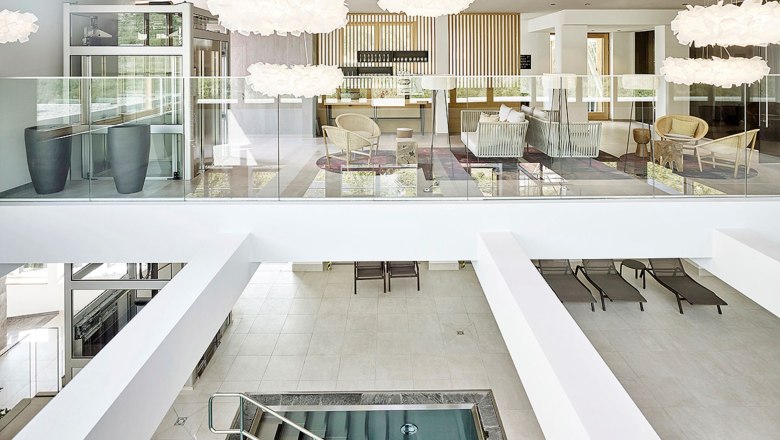 Spa with modern furniture and elegant lighting.