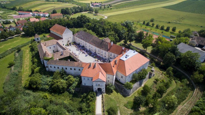 Aerial view of Mailberg Castle with surrounding landscape.