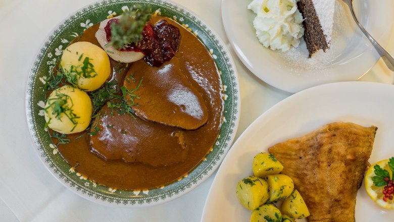 Traditional Austrian dish with meat, dumplings, potatoes and cake.
