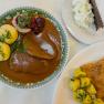 Traditional Austrian dish with meat, dumplings, potatoes and cake.